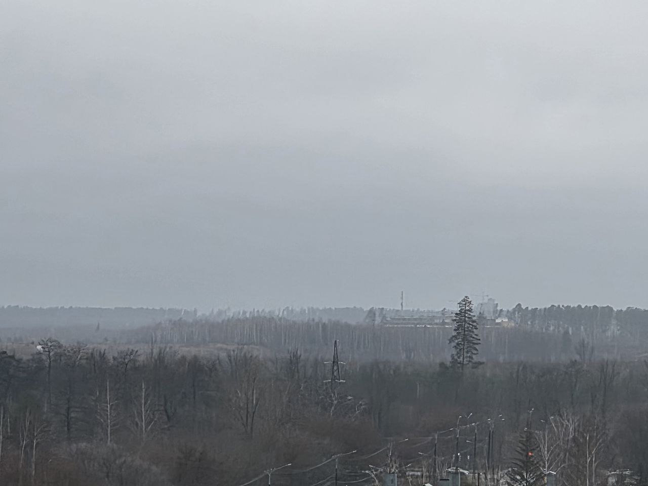 Вместе с дождём на город опустился туман